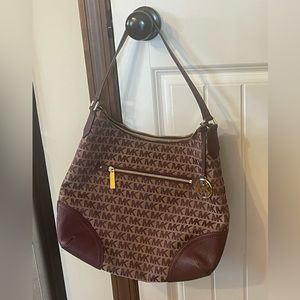 Michael Kors beautiful Maroon & tan pattern handbag. Rarely used, leather trim